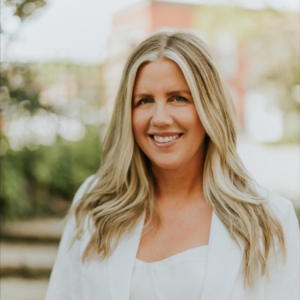 Headshot of Katie, member of Erica Suzanne Matchmaking team